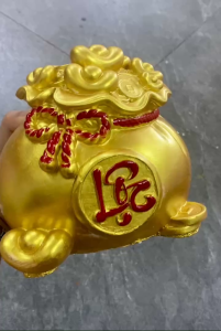 ống heo tiết kiệm thạch cao túi vàng tiết kiệm thạch cao