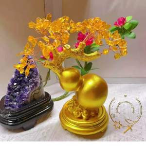 Feng Shui Citrine Money Tree With Wulou Lucky Charm Protection - Golden tree with yellow branches and pink flowers accompanied by amethyst crystal on a white surface.