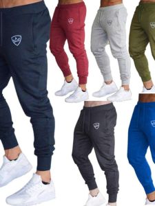 Fashion Casual Solid Color Drawstring Slim Fit Pants mid Waist Elastic Nylon Sportswear Mens Training Trousers Sweat Absorbent