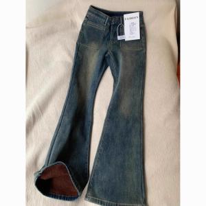 กางเกงยีนส์ทรงขาบานเอวสูงสไตล์ย้อนยุคสำหรับผู้หญิง กางเกงขายาวทรงเข้ารูป ยืดหยุ่นได้หลากหลาย สีดำ ฤดูหนาวปี 2025 กางเกงยีนส์ทรงเข้ารูปสำหรับผู้หญิง