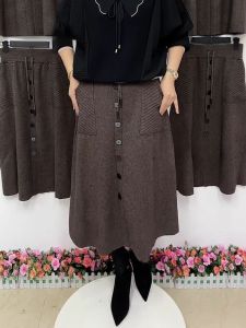 กระโปรงสั้นถักเอวสูงทรงเอเข้ารูป กระโปรงทรงเอผู้หญิง ฤดูหนาว 2024 สีพื้น สไตล์เรียบง่าย กระโปรงทรงเอเข้ารูป