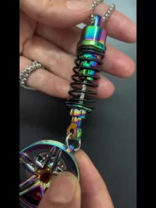 Metal Car Wheel Shock Absorber Pendant Car Wheel Hanging Ornament Rearview Mirror Auto Interior Decoration Bag Hanging Ornament