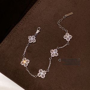 CAFFTI | Golden and Silver Color Tibetan Vajra Iris Clover Five Flower Womens Fashionable Bracelet