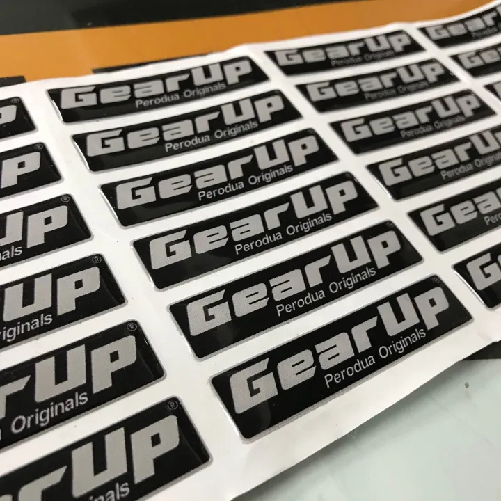 GEAR%20UP%20Logo%20Emblem%20Original%20Design%20Perodua%20Bezza%20Acia%20Myvi%20Ativa%20Alza%20Aruz%20Kancil%20Kelisa%20Kenali%20Kembara%20%20%20Size:%207cm%20x%201.6cm%20%20Ukuran:%2070%20x%2016mm%20%20Sticker%203M%20Original%20Design%20Perodua%20Emblem%20-%20Image%203