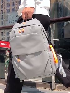 [ของขวัญฟรี]ธุรกิจผู้ชายความจุขนาดใหญ่กระเป๋าคอมพิวเตอร์เดินทางแฟชั่นอังกฤษกระเป๋าสะพายคู่นักศึกษาใหม่กระเป๋าสะพายคู่ที่เรียบง่ายสีเทาดำ