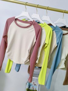 Skinofskin มาใหม่ล่าสุดต้นฤดูใบไม้ร่วงแขนยาวโยคะเสื้อยืดผู้หญิงกระชับประเภทความชื้นดูดซับแห้งเร็วผ้าไนลอนด้วยสแปนเด็กซ์ยืดหยุ่น