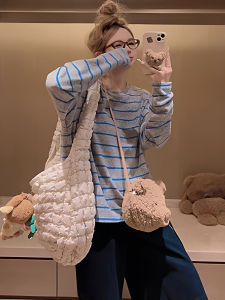 เสื้อยืดคอกลมแขนยาวผู้หญิง 2025 ใหม่ สไตล์เกาหลี ทรงเข้ารูป ลำลอง สำหรับเล่นกีฬา ดีไซน์เก๋ไก๋ ใส่ได้หลากหลาย