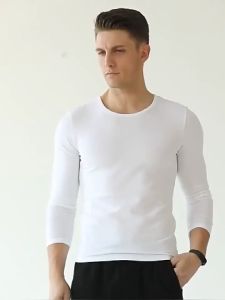 เสื้อยืดแขนยาวผู้ชายคอวีเข้ารูปเสื้อยืดสีทึบเสื้อท่อนบนสำหรับฤดูใบไม้ร่วงบางสำหรับผู้ชายเสื้อซับในคอกลมฤดูใบไม้ร่วง