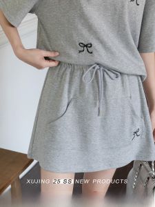 Chân Váy Ngắn Cao Waist Với Túi Và Dây Kéo
