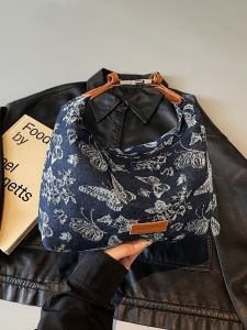 กระเป๋าสะพายข้างผ้าเดนิมซักแล้วสไตล์ใหม่ฤดูใบไม้ร่วงและฤดูหนาวสำหรับผู้หญิง กระเป๋าสะพายข้างแบบสะพายไหล่ข้างเดียว กระเป๋าสะพายข้างแบบมีซิป