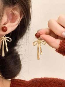 Retro Hong Kong Style Butterfly Knot Earrings Womens Fashion Jewelry Fresh out Alloy Plated Silver Gold Freshwater Pearl