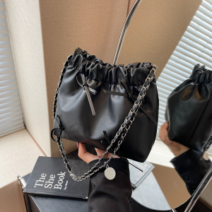 Fashionable 2024 New Womens Shoulder Bag with Butterfly Knot Chain Crossbody Ssatel Magnetic Buckle Soft Surface Bucket Shape