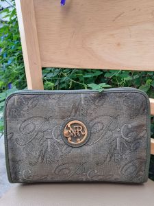 Hàng Si túi cluk cầm tay hiệu Nina Ricci