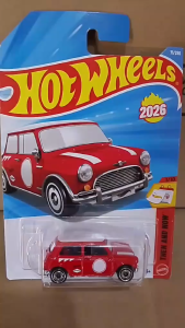 Hot Wheels 2026 Austin Mini Cooper S red toy car with white stripes on blue card. Suitable for ages 3 and up.
