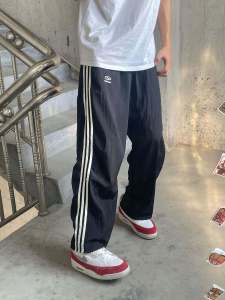 กางเกงกีฬาลำลองสไตล์สตรีทย้อนยุคแบบอเมริกัน กางเกงขายาวทรงตรงหลวมๆ แห้งเร็ว สำหรับผู้ชายและผู้หญิงในฤดูใบไม้ผลิและฤดูร้อน