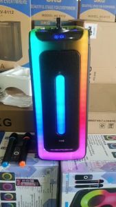 SKG ลำโพงบลูทูธ พกพา 8 นิ้ว x2ดอก ไมค์ลอย=2ตัว แสงสีวิบวับ เปลี่ยนโหมดไฟได้ 40W RMS รุ่น SR-207