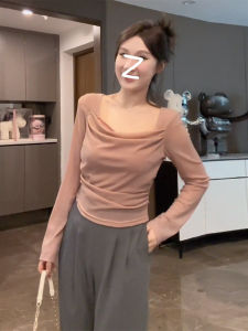 เสื้อยืดคอกว้างแขนยาวทรงเข้ารูปไซส์ใหญ่สำหรับผู้หญิง ทรงเก๋ไก๋ สไตล์ฝรั่งเศส Pure Desire เสื้อผ้าทำงานแฟชั่นฤดูใบไม้ผลิ