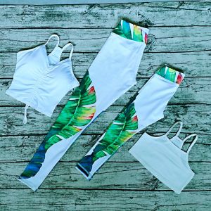 ชุดโยคะคู่รักแฟชั่นสำหรับเด็กผู้หญิง กางเกงขาสั้นสายเดี่ยวแบบมีแผ่นรองหน้าอก เสื้อผ้ากีฬาแบบกระชับสัดส่วน ผ้าไนลอน ฤดูใบไม้ผลิ 2024