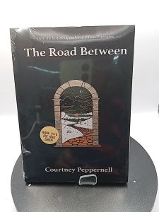 The Road Between by Courtney Peppernell
