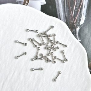 ชาร์มเล็บโลหะผสมรูปดาวและกากบาท ดีไซน์หรูหราทันสมัย 30 ชิ้น ตกแต่งเล็บ 3 มิติ สไตล์มินิมอล พร้อมเข็มกลัดรูปลูกศร สำหรับตกแต่งเล็บ DIY