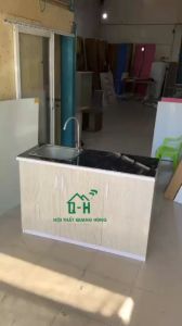 TỦ BẾP NHỰA ĐÀI LOAN MÀU KEM BAO GỒM BỒN VÀ VÒI