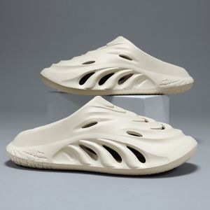 รองเท้าคร็อคส์รองเท้าแตะเปิดส้นปิดหัวสำหรับห้องผ่าตัดกันลื่นใส่ออกข้างนอกฤดูร้อนแบบผู้ชายรองเท้าแตะชายหาดกีฬาสำหรับคู่รักให้ความรู้สึกอึ