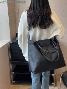 กระเป๋าเดินทางผ้าใบ กระเป๋าเดินทางแบบสะพายไหล่ข้างเดียวสำหรับผู้หญิง ความจุขนาดใหญ่ กระเป๋าใส่ของสำหรับเดินทางระยะสั้นแบบลำลอง กระเป๋าเดินทางแบบพกพา