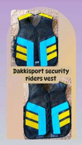 Dakkisport security riders vest with blue and yellow reflective stripes for safety.