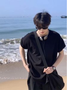 เสื้อยืดคอกลมแขนสั้นผ้าฝ้ายแท้สีดำสไตล์อเมริกัน ทรงหลวม ระบายอากาศได้ดี สำหรับผู้ชาย ฤดูร้อน 2025 แฟชั่น