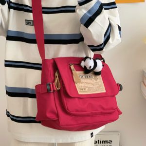 กระเป๋าสะพายข้างผ้าใบความจุขนาดใหญ่สําหรับผู้หญิง 2023 สไตล์ญี่ปุ่น Casual Retro Messenger กระเป๋าที่สมบูรณ์แบบสําหรับนักเรียน