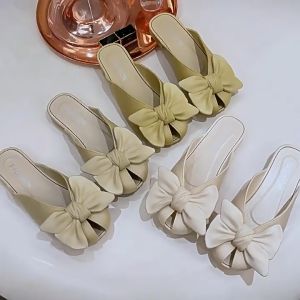 รองเท้าแตะแบบสวมสบายแบบกึ่งลาก โบว์ แบบกลวง แฟชั่น