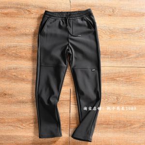 กางเกงกีฬาผู้ชายทรงหลวมเอวยางยืด ผ้ากำมะหยี่ผสมโพลีเอสเตอร์และยางยืด ทรงตรง ฤดูใบไม้ร่วง/ฤดูหนาว กางเกงขายาวสีพื้น