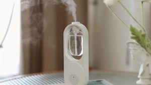 Home Toilet Oil Diffuser & Rechargeable Aroma Diffuser: A Comprehensive Guide\\n\\n What is a Home Toilet Oil Diffuser & Rechargeable Aroma Diffuser?\\n\\nA Home Toilet Oil Diffuser & Rechargeable Aroma Diffuser is a compact, portable device designed to enhance the air quality and ambiance of any room. It utilizes ultrasonic technology to atomize essential oils, releasing a fine mist that fills the space with a delightful fragrance. This particular model boasts a wireless design, allowing users to hang it on the wall, place it on a desk, or move it around their home as needed. \\n\\n Product Specifications\\n\\n- Working Voltage: 3.7-5V\\n- Rated Power: 1W\\n- Product Weight: 96g\\n- Power: 500mAh lithium battery\\n- Essential Oil Capacity: 50ml\\n- Atomization Area: 50 square meters\\n- Material: ABS\\n- Product Size: 196.5 * 67.5 * 35.5mm\\n\\n Key Features\\n\\n- Wireless Design: This device can be hung on the wall, placed on a desk, or moved around the home, providing flexibility and convenience.\\n- Waterless Operation: Unlike traditional humidifiers, this diffuser requires no water, allowing for stronger and longer-lasting fragrance.\\n- Flameless Operation: Eliminate fire hazards by using this diffuser instead of candles or incense sticks.\\n- Ultrasonic Atomization: This technology disperses molecules quickly without altering the composition of the oil, ensuring the purest aroma.\\n\\n Why Choose a Home Toilet Oil Diffuser & Rechargeable Aroma Diffuser?\\n\\nThere are several reasons why you should consider purchasing this Home Toilet Oil Diffuser & Rechargeable Aroma Diffuser:\\n\\n- **Wireless Design:** This device can be easily moved around the home, providing a convenient and flexible solution for enhancing air quality and ambiance.\\n- **Waterless Operation:** By eliminating the need for water, this diffuser allows for stronger and longer-lasting fragrance.\\n- **Flameless Operation:** This diffuser is a safer alternative to candles or incense sticks, reducing fire hazards.\\n- **Ultrasonic Atomization:** This technology ensures that the purest aroma is released, providing a more authentic experience.\\n\\n How to Use Your Home Toilet Oil Diffuser & Rechargeable Aroma Diffuser?\\n\\nUsing this diffuser is simple and straightforward. Here are the steps to follow:\\n\\n Manual Mode\\n\\nTo use the manual mode, simply press the button to release a fine mist of essential oil into the air. Long press for 5 seconds to turn on and switch fragrance concentration at will.\\n\\n Automatic Mode\\n\\nTo use the automatic mode, press the button once to turn on the diffuser. It will automatically release a fine mist of essential oil at regular intervals.\\n\\n 5-Scent Disperse Mode\\n\\nThis diffuser offers five different scent disperse modes, allowing users to customize their experience:\\n\\n- Strong Intensity Mode: Red light (release aroma mist for 3 seconds every 5 minutes, light up when switching mode)\\n- Mid Intensity Mode: Amber light (spray 3 seconds every 15 minutes, turn on the light)\\n- Low Intensity Mode: Green light (spray 3 seconds every 30 minutes, turn on the light)\\n- Intermittent Mode: Blue light (spray 3 seconds every 60 minutes, turn on the light)\\n- Continuous Mode: White light (spray continuously, turn on the light)\\n\\n Conclusion\\n\\nThe Home Toilet Oil Diffuser & Rechargeable Aroma Diffuser is a versatile and convenient device that enhances air quality and ambiance in any room. With its wireless design, waterless operation, flameless operation, and ultrasonic atomization technology, this diffuser provides a safer and more authentic experience than traditional humidifiers or candles. Its simple and intuitive operation makes it easy to use, while its five different scent disperse modes allow users to customize their experience. Whether you're looking to freshen up your home or hotel room, this diffuser is the perfect choice.\n}