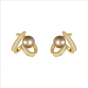 Heart-shaped pearl earrings with gold-tone metal and small clear stones. Tiny stud design for womens fashion. Exquisite jewelry for accessories