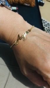 Gelang serut Titanium request nama sendri kuning lapis emas 24k