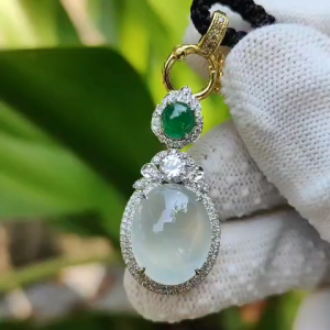 18k Gold Pendant Setting with 1 green cabochon and small diamonds with 1 CZ Old Mine Natural Type A Jadeite with NGI Gemstone report weight 4.94 grams 15.66 * 12.60 * 6.00 mm which is Highly Translucent Icy and very fine grain crystal aggregate (18kp8)