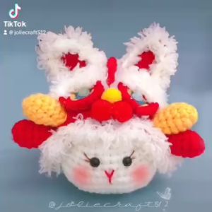 Móc treo - móc khóa bé thỏ đội mũ lân - đan len thủ công