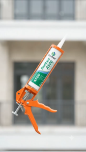 Súng ép keo silicone màu cam với thanh đẩy kim loại khung nhựa bền