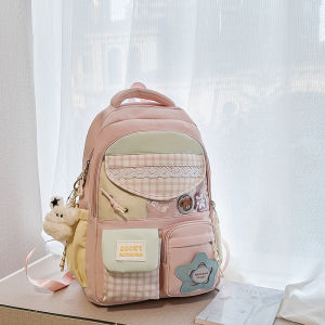 กระเป๋าเป้สะพายหลังนักเรียนประถมสีดำความจุขนาดใหญ่ 2025 กระเป๋าเป้สะพายหลังผ้าใบสไตล์ใหม่สำหรับผู้หญิง กระเป๋าสะพายไหล่แบบสองข้าง