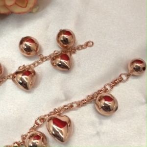 สร้อยข้อมือนากแฟชั่น ลายห่วงห้อยกระพรวน หัวใจ ความยาว 7 8 นิ้ว ดีไซน์สวย สีโรสโกลด์ งานชุบ ใช้ได้ทุกโอกาส พร้อมส่ง