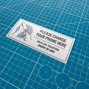 Please Charge your Phone Here. Sila Caj Telefon Anda di Sini. Premium Sticker Sign Signage Notice Label. Device Charging