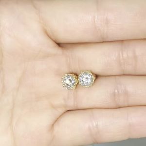 A pair of 925 sterling silver moissanite snowflake earrings for men women and couples.