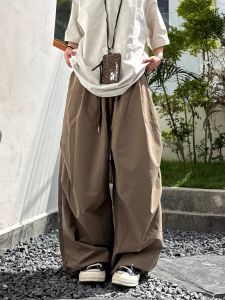 กางเกงขายาวทรงหลวมสบาย ๆ สีน้ำตาลสำหรับผู้ชาย กางเกงขายาวทรงตรงลำลองฤดูร้อนปี 2025 ทรงหลวม กางเกงขายาวสไตล์ทำงาน