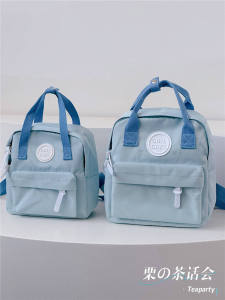 น้ำหนักเบา กระเป๋าเดินทางกระเป๋าเป้สะพายหลังโรงเรียนสไตล์ญี่ปุ่นขนาดกะทัดรัดสําหรับเด็กและนักเรียนกระเป๋าแม่ ลำลอง สถานการณ์พับได้