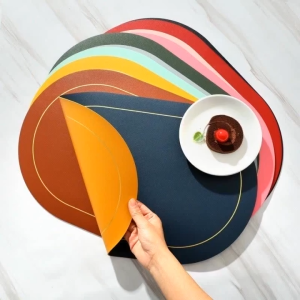 แผ่นรองจานหนัง PU ทรงรีสไตล์นอร์ดิก แผ่นรองกันความร้อนน้ำมัน ทนทาน ใช้งานได้จริง