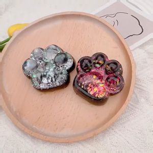 ของเล่นคลายเครียดรูปกรงเล็บแมว Dark Starry Sky Series 2 ชิ้น ของเล่นบีบรูปอุ้งเท้าแมวสีสันสดใส ของเล่นบีบรูปอุ้งเท้าแมวแบบพกพา ของเล่นคลายเครียดและซิลิโคนเลียนแบบสำหรับคลายโคลน ของเล่นคลายเครียดรูปอุ้งเท้าแมวใส