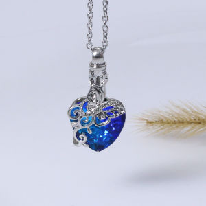 A Butterfly Tree of Life Urn Necklace Commemorating Loved Ones and Pets Used to Hold the Ashes of Loved Ones or Pets Suitable