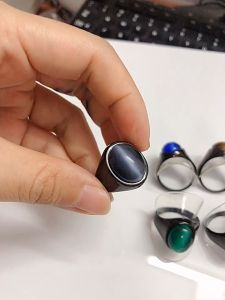 Trendy Black Stainless steel Cat Eye Stone Ring Oval Black Red Stone Ring For Both Men and Women