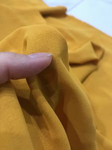 Vải Đũi cotton màu vàng nghệ mềm  rũ không nhăn(khổ 1m5)may đầm váy áo kiểu quần suông