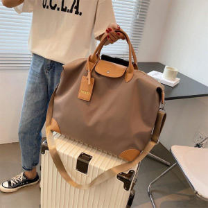 ARCTIC HUNTER กระเป๋าเดินทางเเบบถือ กระเป่าเดินทางผ้าออกฟอร์ดทรงเหลี่ยมถือได้สะพายได้ มีสายคาดเสริมกระเป๋าที่ด้านหลังกระเป๋า